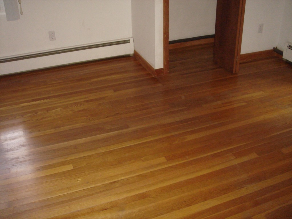 23 Lyndon Road Sharon, MA 02067 - Photo 11 of 17 a view of an empty room with wooden floor