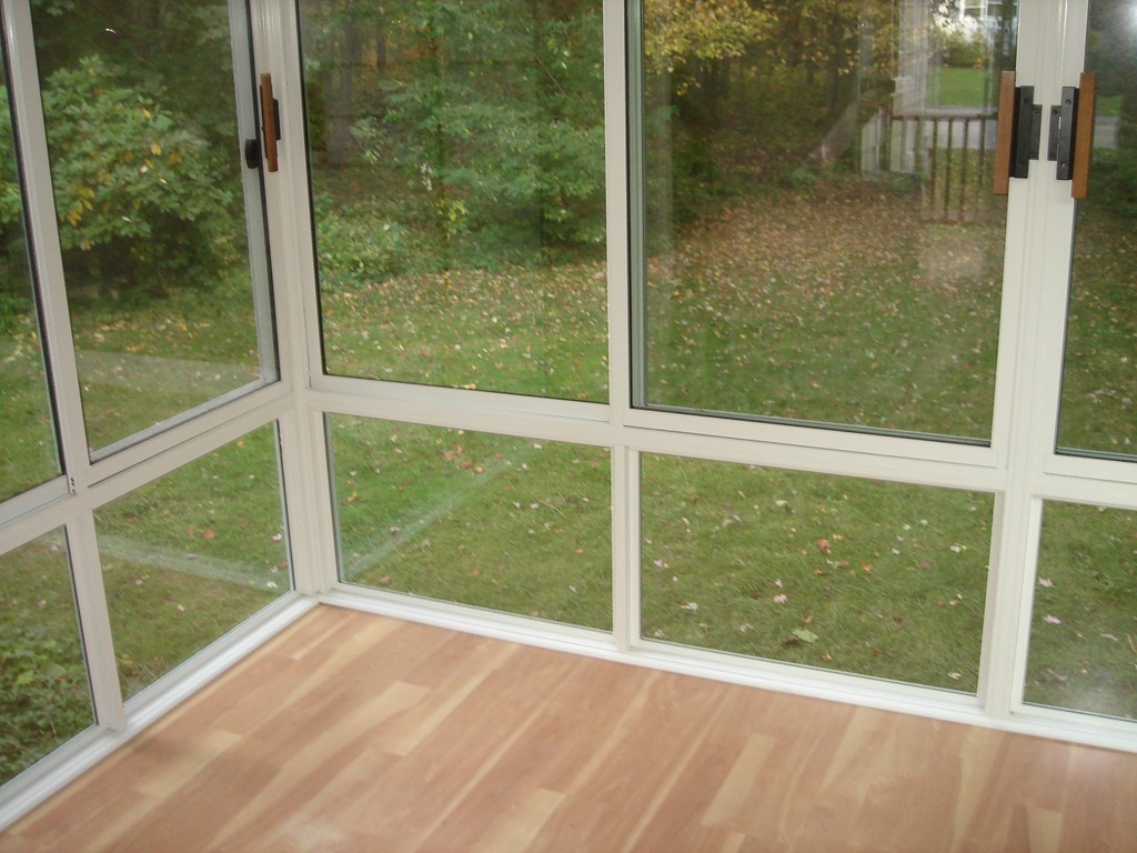 23 Lyndon Road Sharon, MA 02067 - Photo 14 of 17 a view of a glass door and a yard from a window
