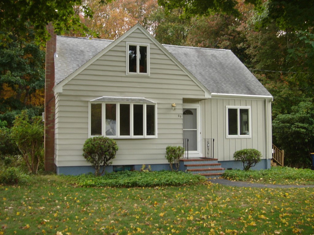 23 Lyndon Road Sharon, MA 02067 - Photo 2 of 17 a front view of a house with garden