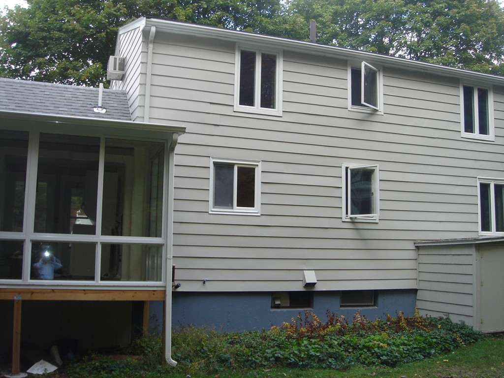 23 Lyndon Road Sharon, MA 02067 - Photo 6 of 17 a view of a house with a balcony