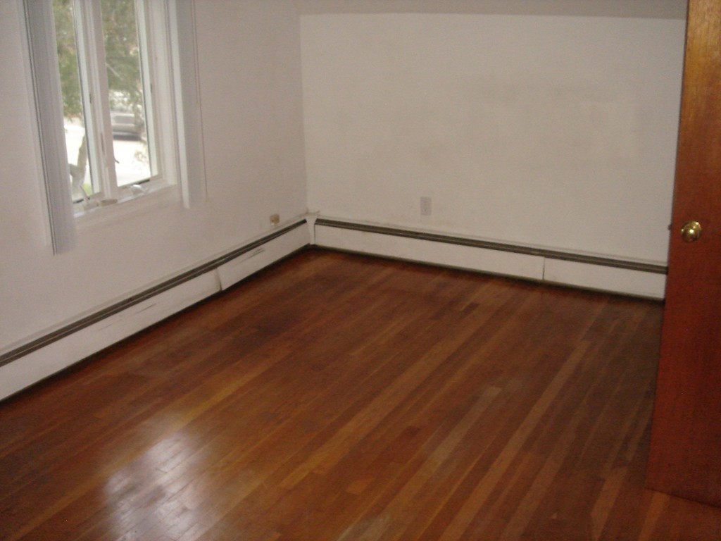 23 Lyndon Road Sharon, MA 02067 - Photo 9 of 17 a view of a room with wooden floor and window