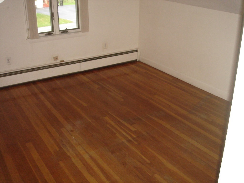 23 Lyndon Road Sharon, MA 02067 - Photo 10 of 17 a view of a room with wooden floor and window