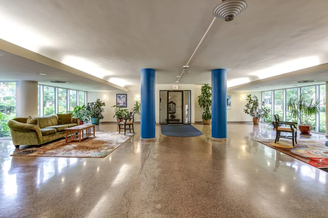 5630 North Sheridan Road, Unit 1205 Chicago, IL 60660 - Photo 2 of 7 a living room with furniture and a large window