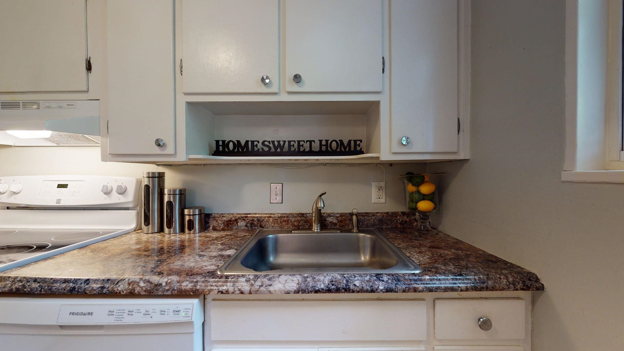845 Bryan Street Raleigh, NC 27605 - Photo 17 of 31 Kitchen- large sink with disposal and a dishwasher.
