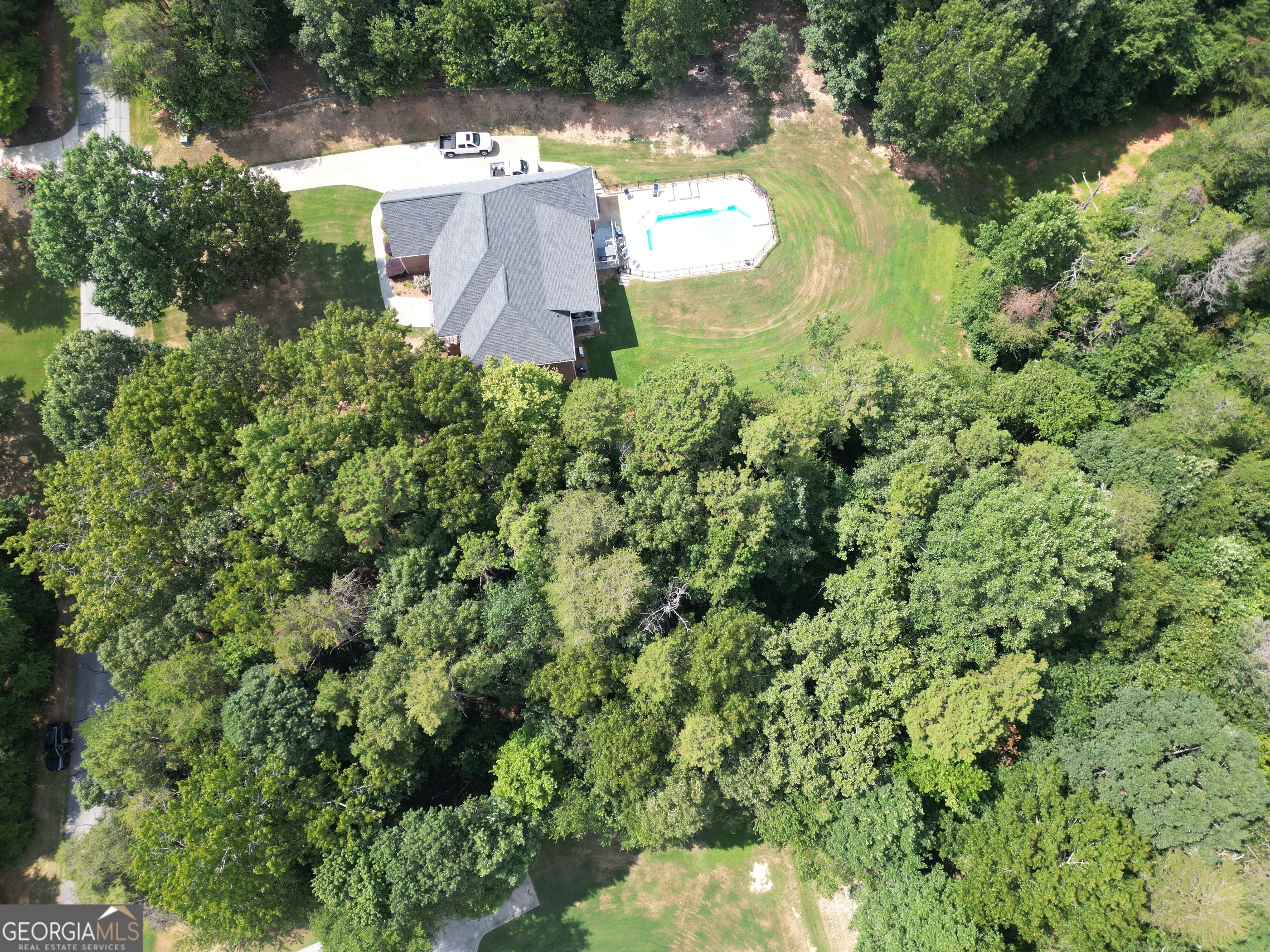 Lot 21 Deer Chase Road Toccoa, GA 30577 - Photo 2 of 7 an aerial view of a house with yard swimming pool and outdoor seating
