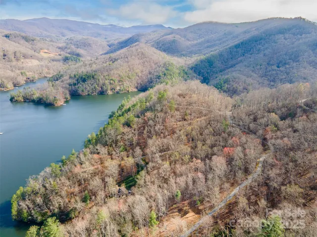 a view of a lake with mountains in the background
