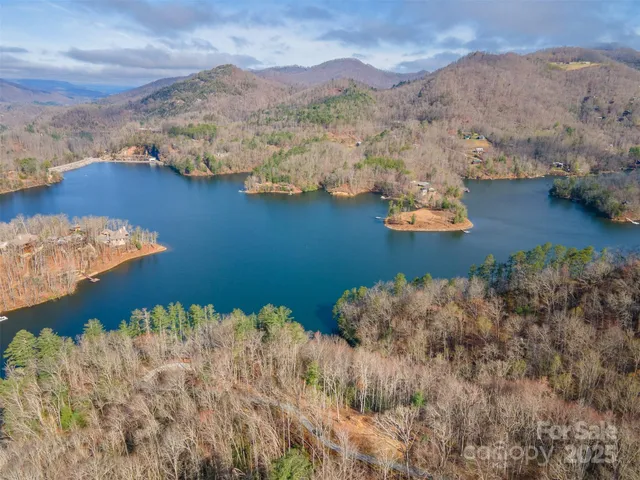 a view of a houses with a lake view