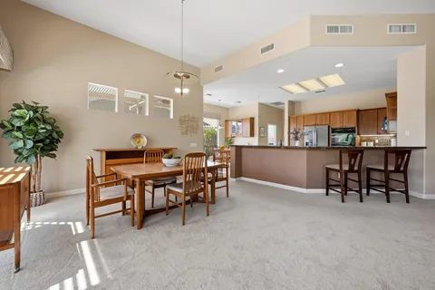 a view of a dining room with furniture