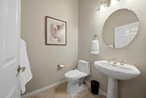 a bathroom with a toilet and a sink