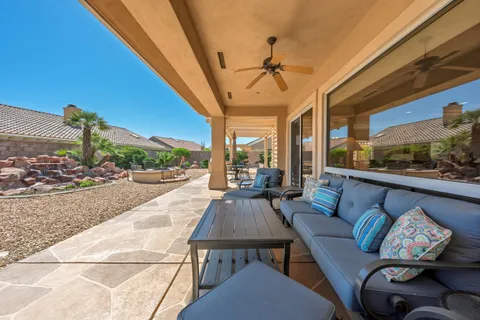 a outdoor space with patio the couches and a potted plant