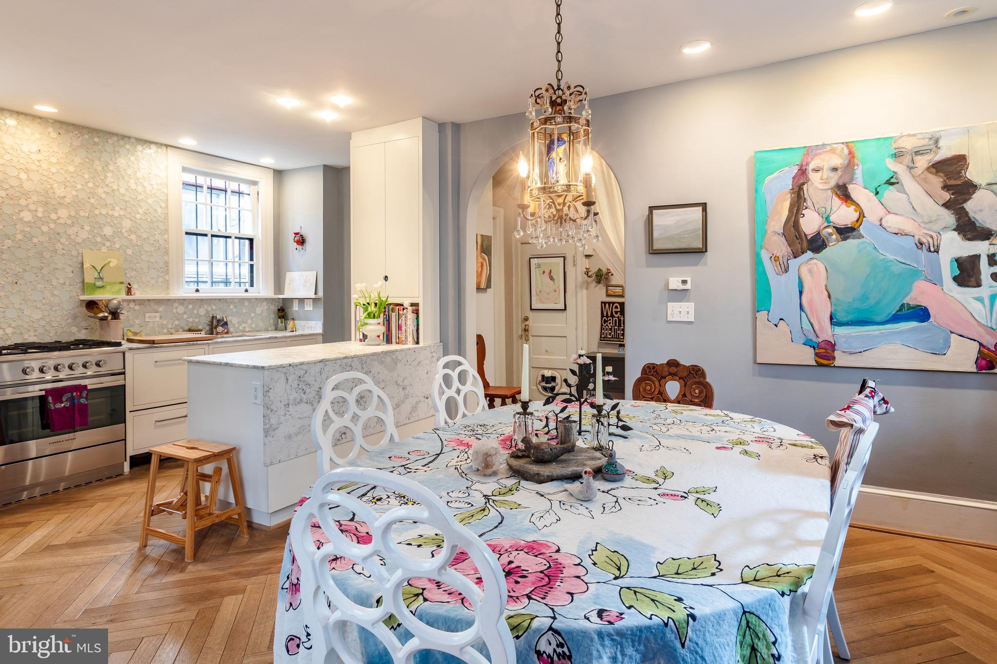 2633 15th Street Northwest, Unit 3 Washington, DC 20009 - Photo 11 of 53 a very nice looking dining room with kitchen island furniture and a chandelier