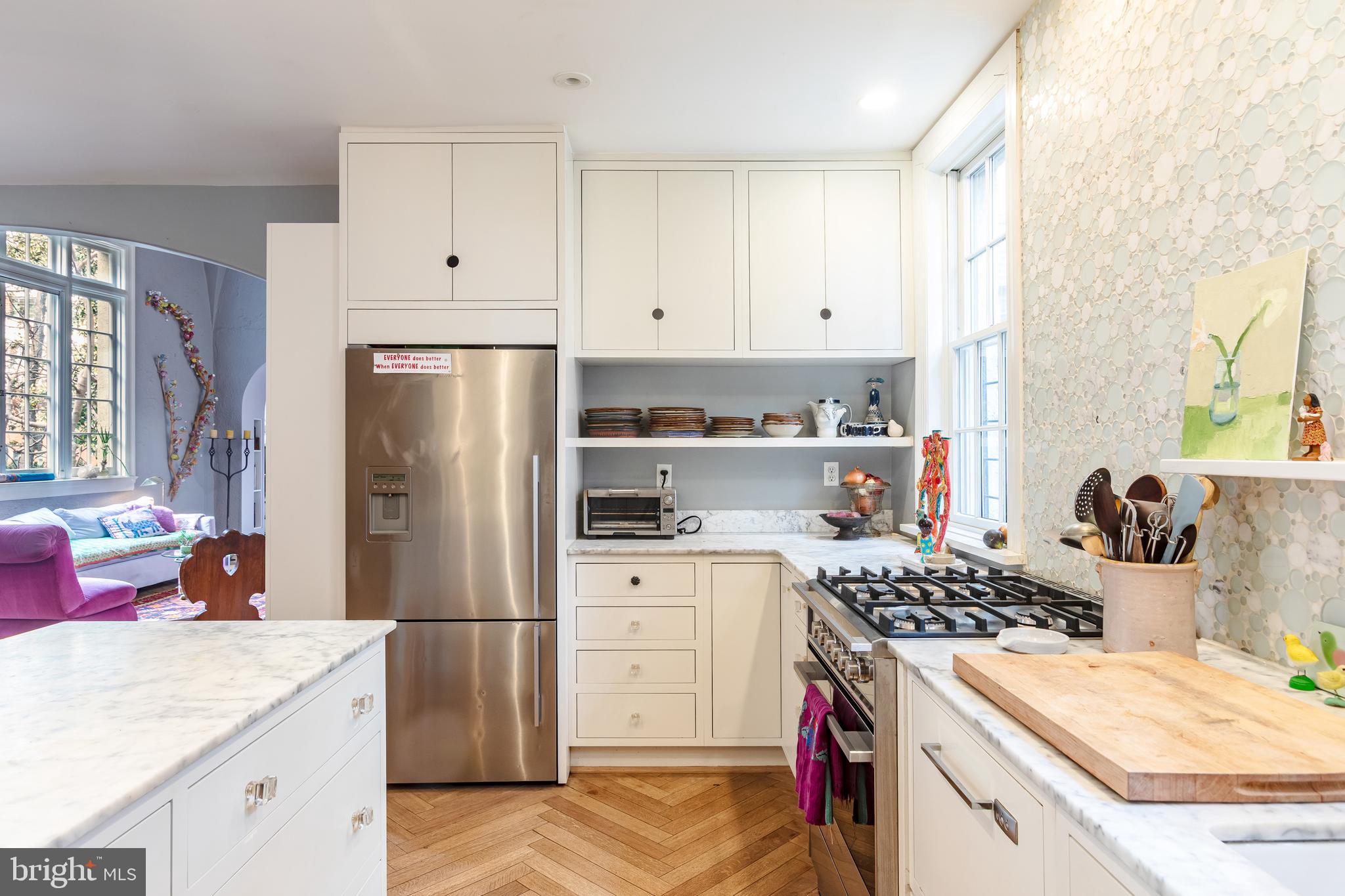 2633 15th Street Northwest, Unit 3 Washington, DC 20009 - Photo 19 of 53 a kitchen with a stove a refrigerator and a stove