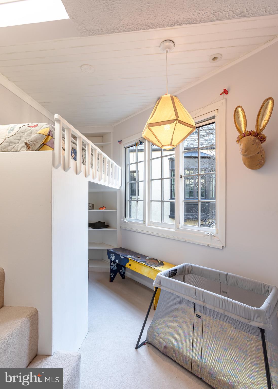 2633 15th Street Northwest, Unit 3 Washington, DC 20009 - Photo 35 of 53 a living room with a window