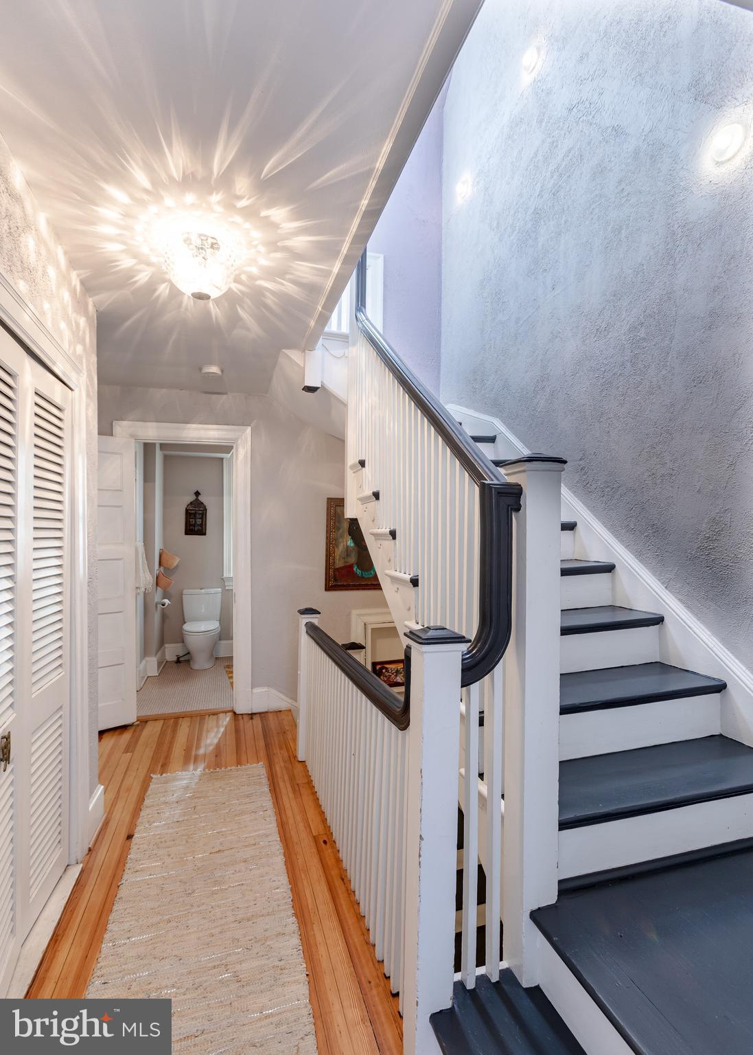 2633 15th Street Northwest, Unit 3 Washington, DC 20009 - Photo 37 of 53 a view of a hallway with wooden floor and staircase