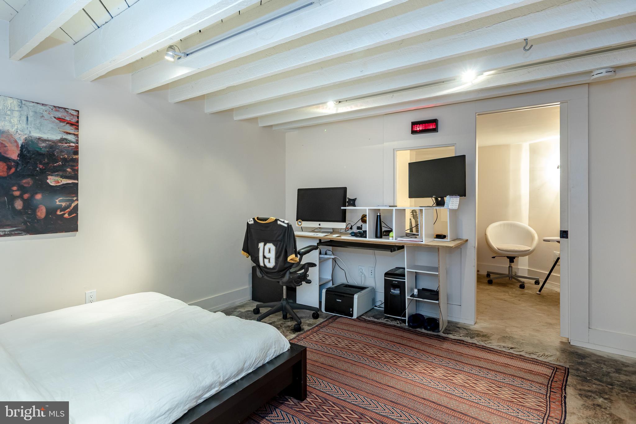 2633 15th Street Northwest, Unit 3 Washington, DC 20009 - Photo 47 of 53 a bedroom with a bed and a desk