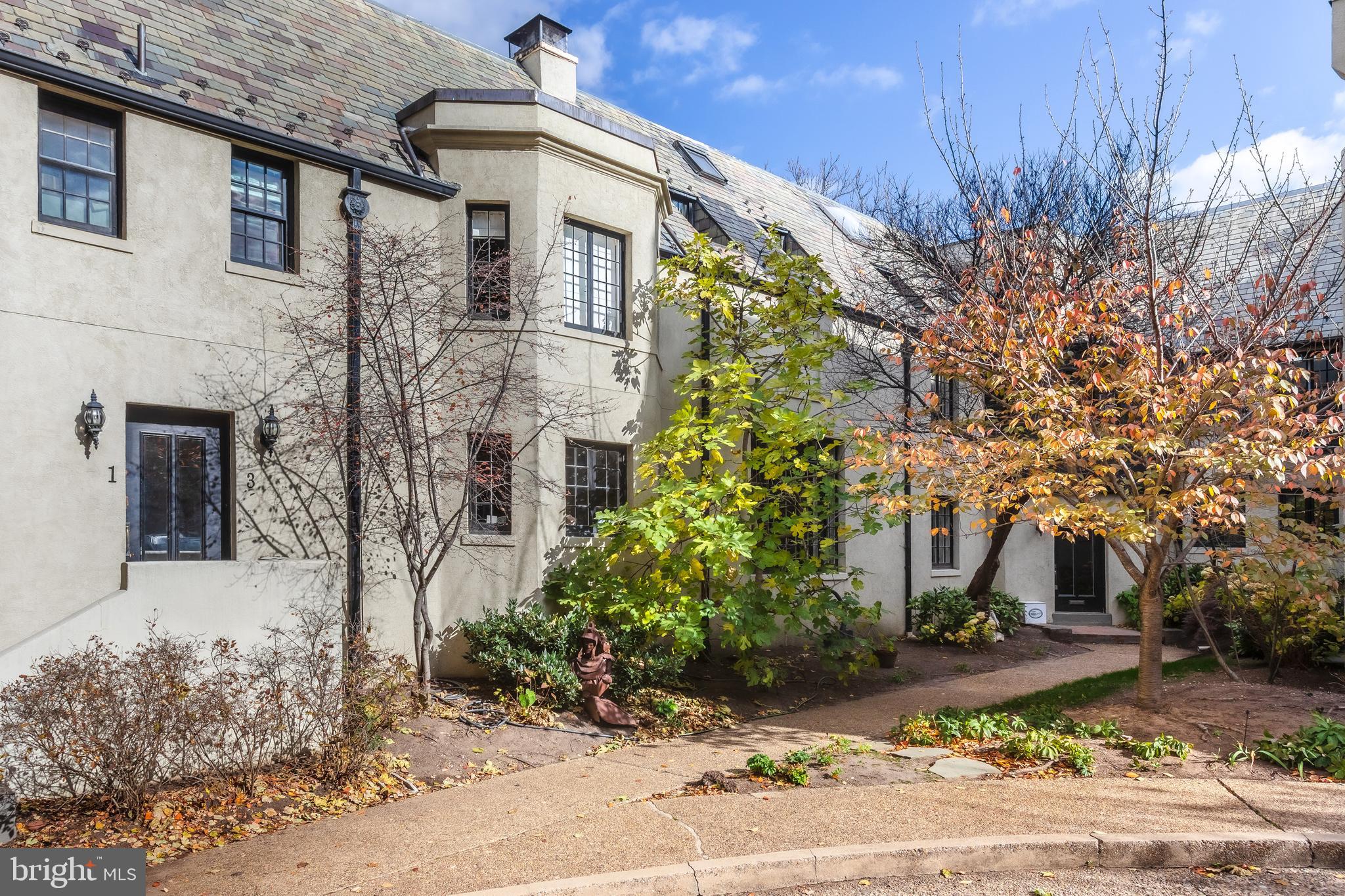 2633 15th Street Northwest, Unit 3 Washington, DC 20009 - Photo 51 of 55 a front view of a house with garden