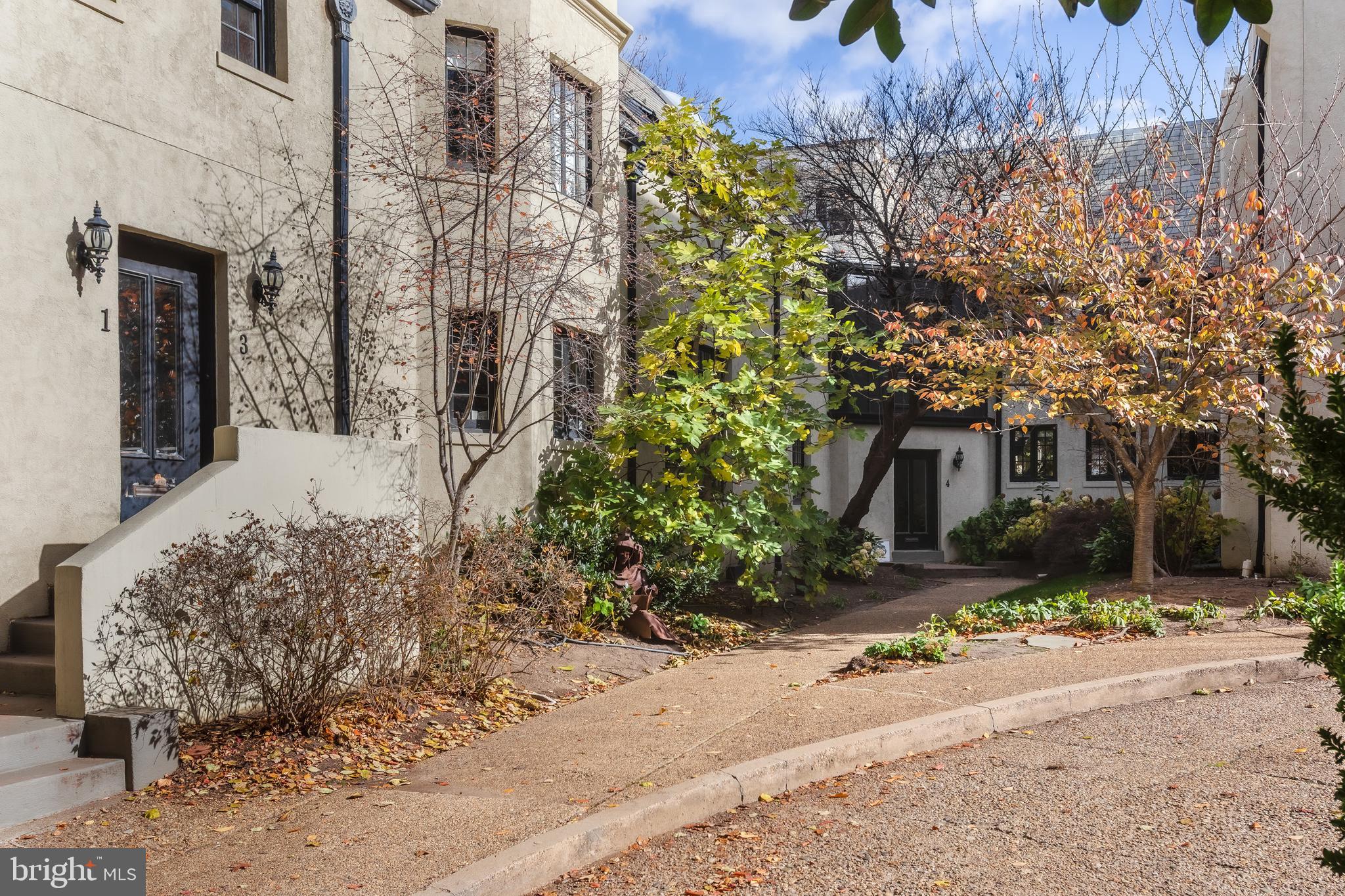 2633 15th Street Northwest, Unit 3 Washington, DC 20009 - Photo 53 of 55 a front view of a house with a yard