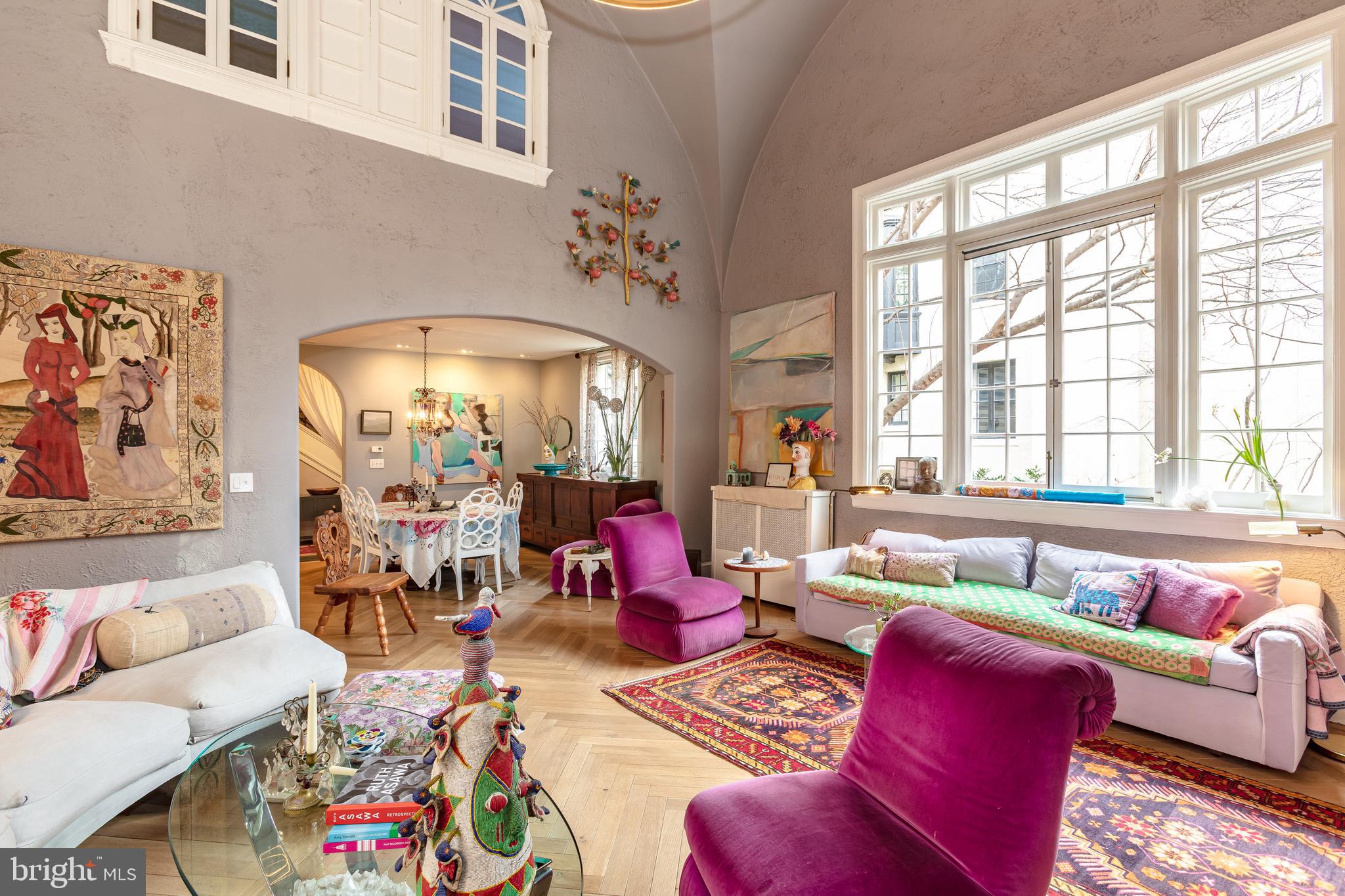 2633 15th Street Northwest, Unit 3 Washington, DC 20009 - Photo 6 of 53 a living room with furniture and floor to ceiling windows