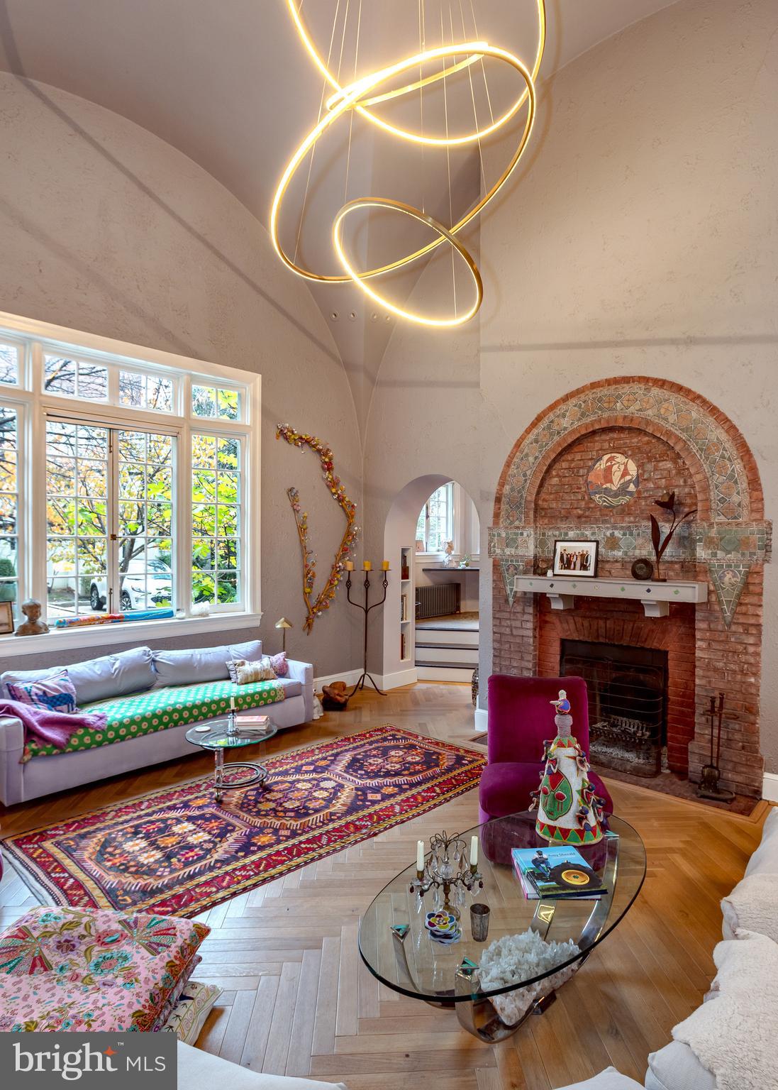 2633 15th Street Northwest, Unit 3 Washington, DC 20009 - Photo 7 of 53 a living room with furniture and a fireplace