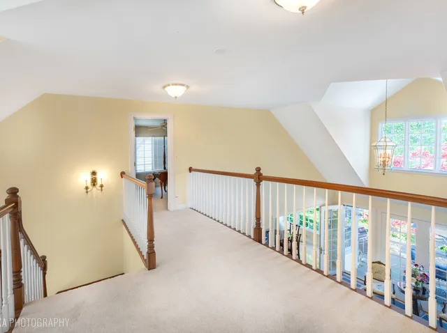a view of a hallway with windows