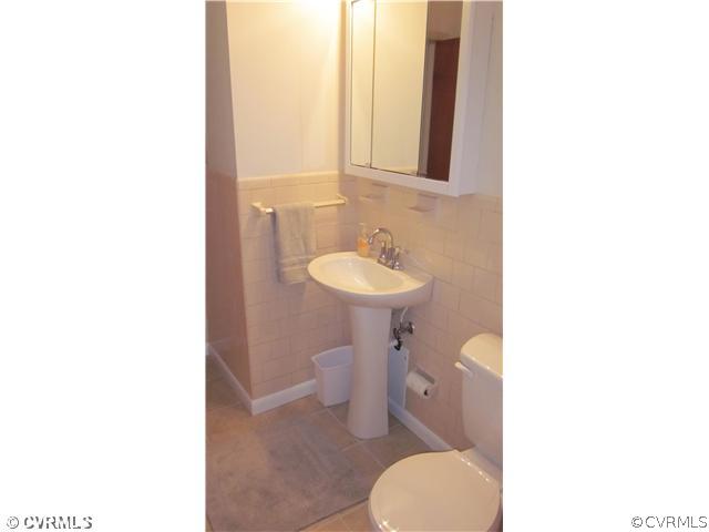6923 Shawnee Road Richmond, VA 23225 - Photo 5 of 12 Master Bath - NEW TILE FLOOR, PEDISTAL SINK, TOILE