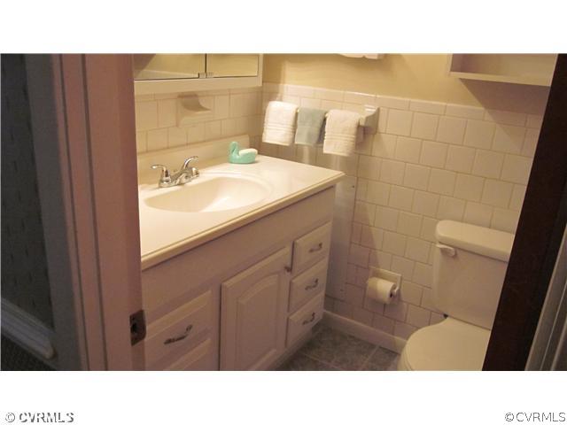 6923 Shawnee Road Richmond, VA 23225 - Photo 7 of 12 Other - Hall Bath with NEW tile flooring, raised t