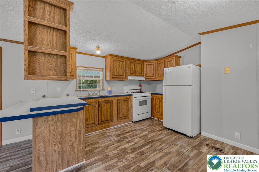 2674 Williams Road Danielsville, PA 18038 - Photo 15 of 31 Functional kitchen with ample cabinetry and easy-care flooring awaits your culinary endeavors.