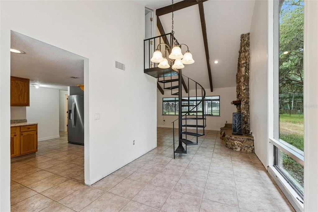 1142 Buckles Road Pierson, FL 32180 - Photo 12 of 34 a view of a livingroom with furniture and entryway