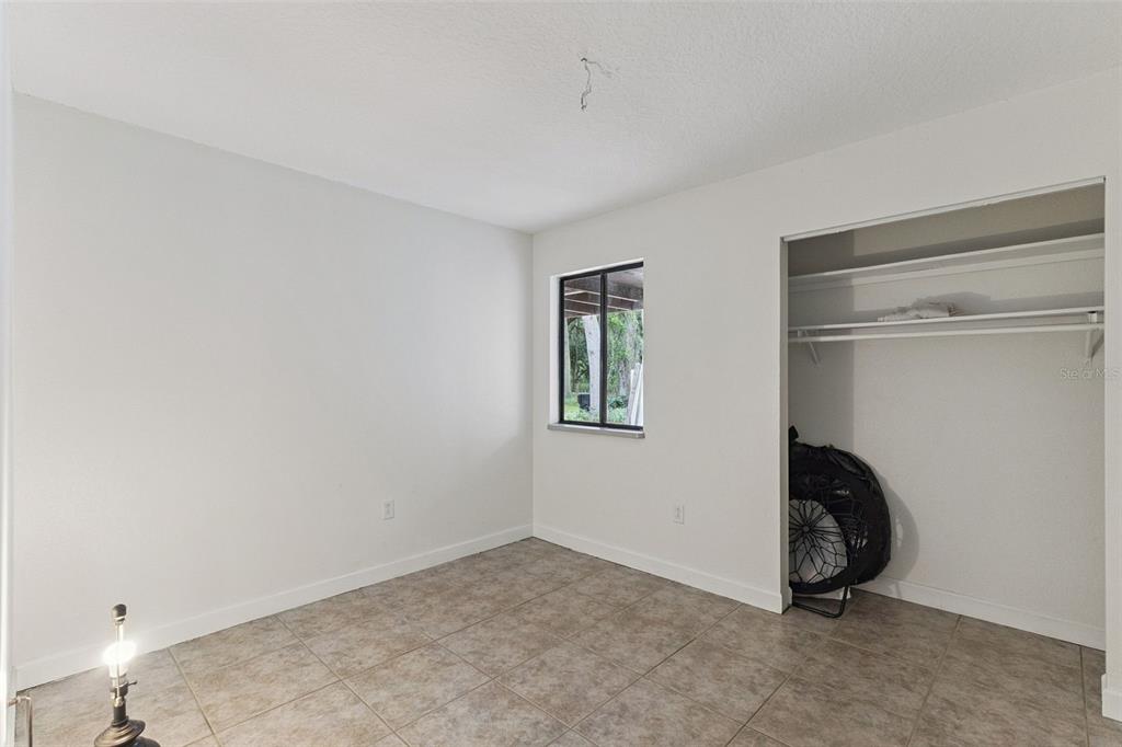 1142 Buckles Road Pierson, FL 32180 - Photo 17 of 34 a view of a room with window and closet