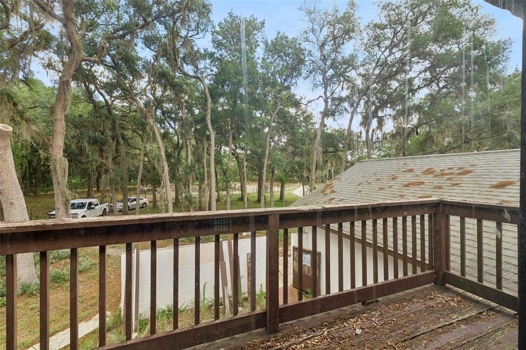 1142 Buckles Road Pierson, FL 32180 - Photo 20 of 34 a view of a wooden roof deck