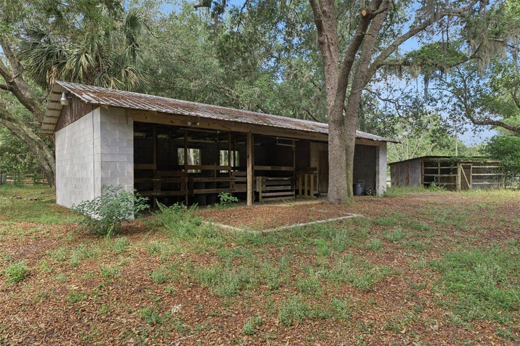 1142 Buckles Road Pierson, FL 32180 - Photo 26 of 34 a front view of a house with garden