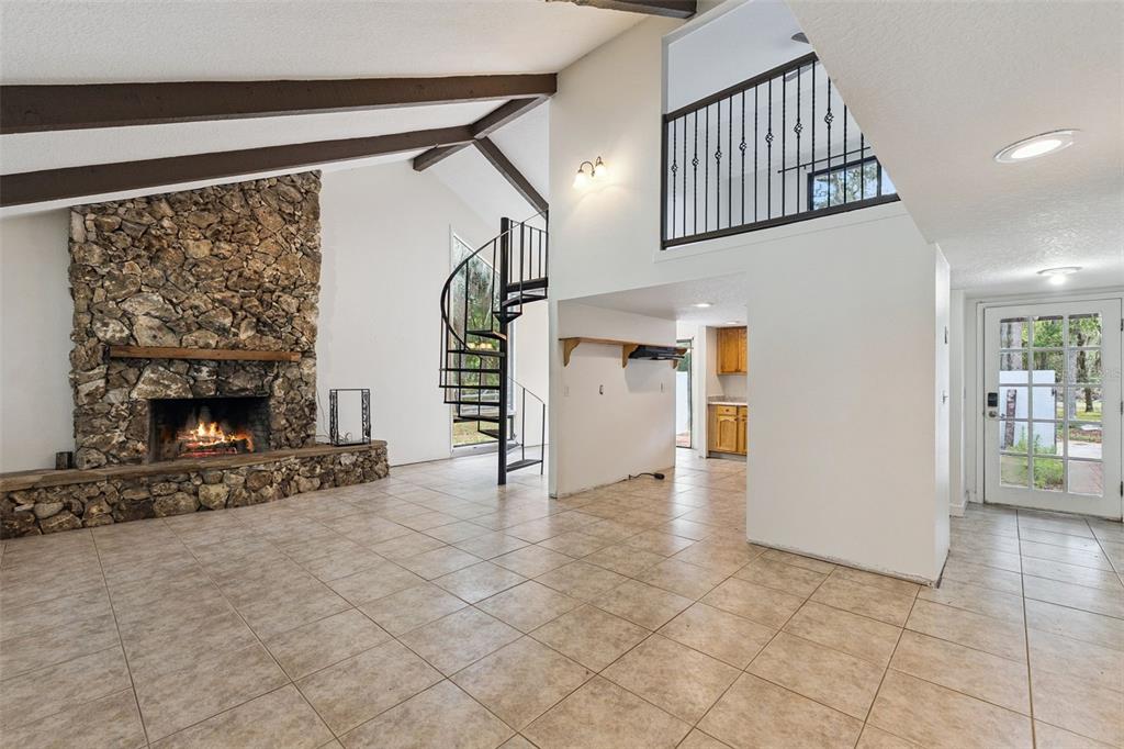 1142 Buckles Road Pierson, FL 32180 - Photo 3 of 34 a view of a livingroom with a fireplace and window