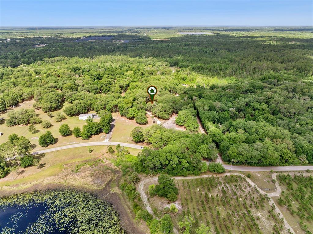 1142 Buckles Road Pierson, FL 32180 - Photo 31 of 34 a view of an outdoor space and a lake view