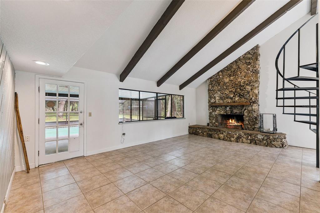 1142 Buckles Road Pierson, FL 32180 - Photo 4 of 34 a view of an empty room with windows