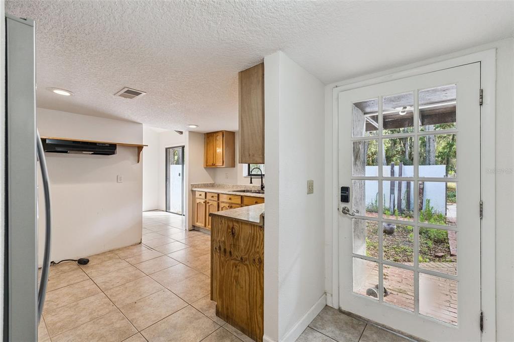 1142 Buckles Road Pierson, FL 32180 - Photo 8 of 34 a view of a kitchen from the hallway