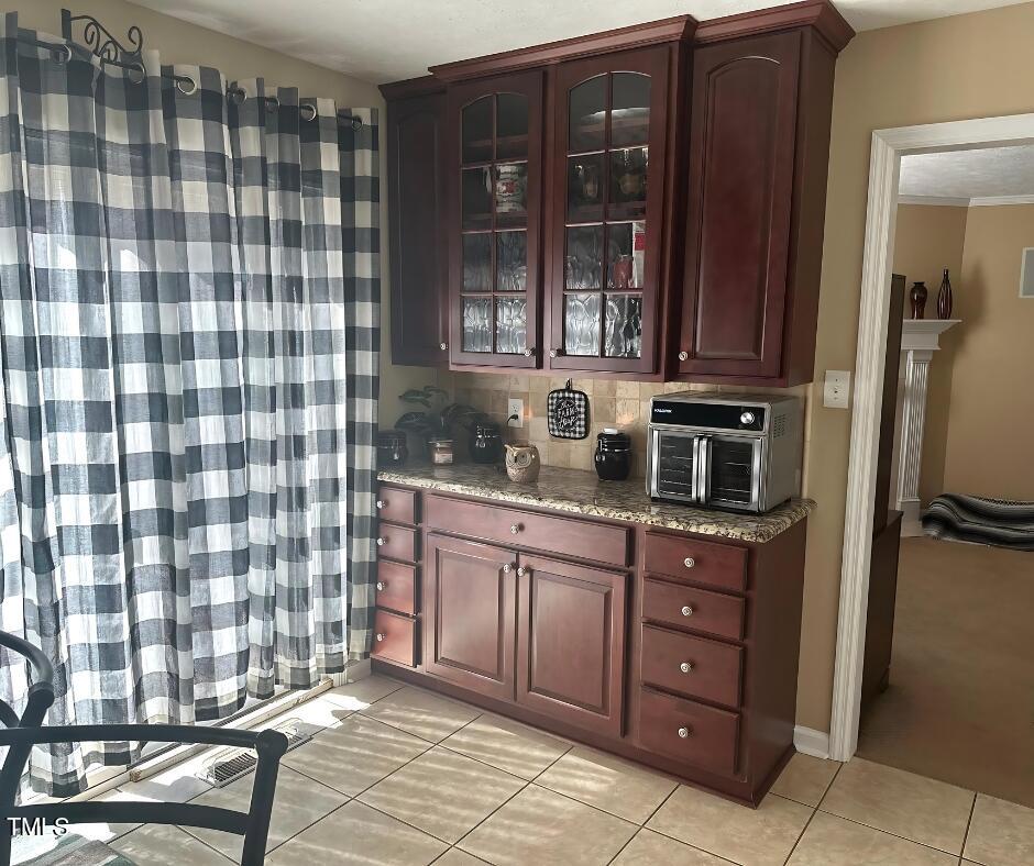 2937 Thrower Road Hope Mills, NC 28348 - Photo 13 of 20 a kitchen with a sink a refrigerator and cabinets