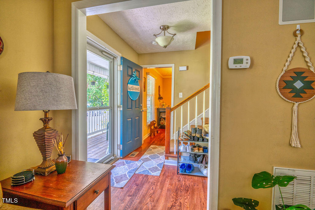 2937 Thrower Road Hope Mills, NC 28348 - Photo 5 of 20 a view of a workspace with furniture and a window