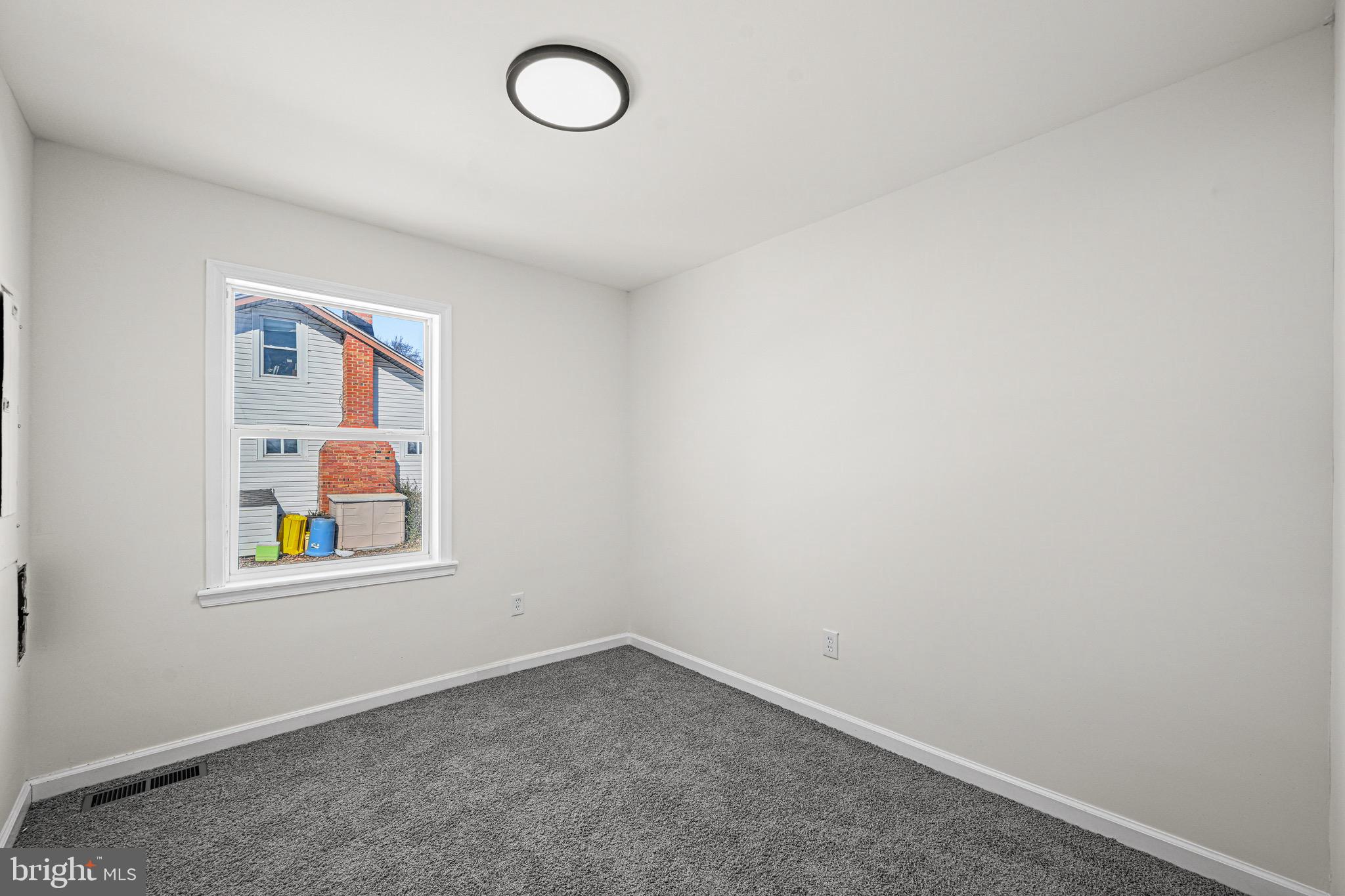 3718 4th Avenue Edgewater, MD 21037 - Photo 21 of 34 an empty room with windows