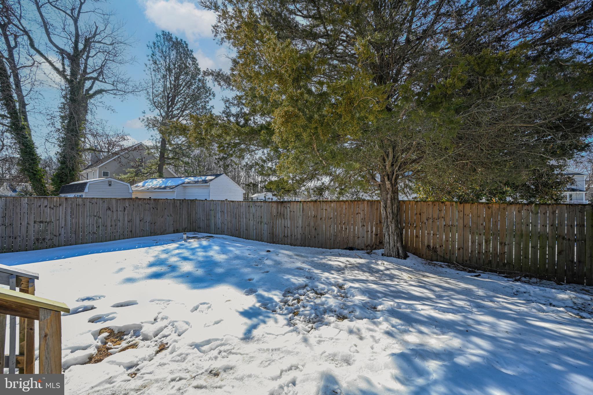 3718 4th Avenue Edgewater, MD 21037 - Photo 28 of 34 a view of backyard with wooden fence
