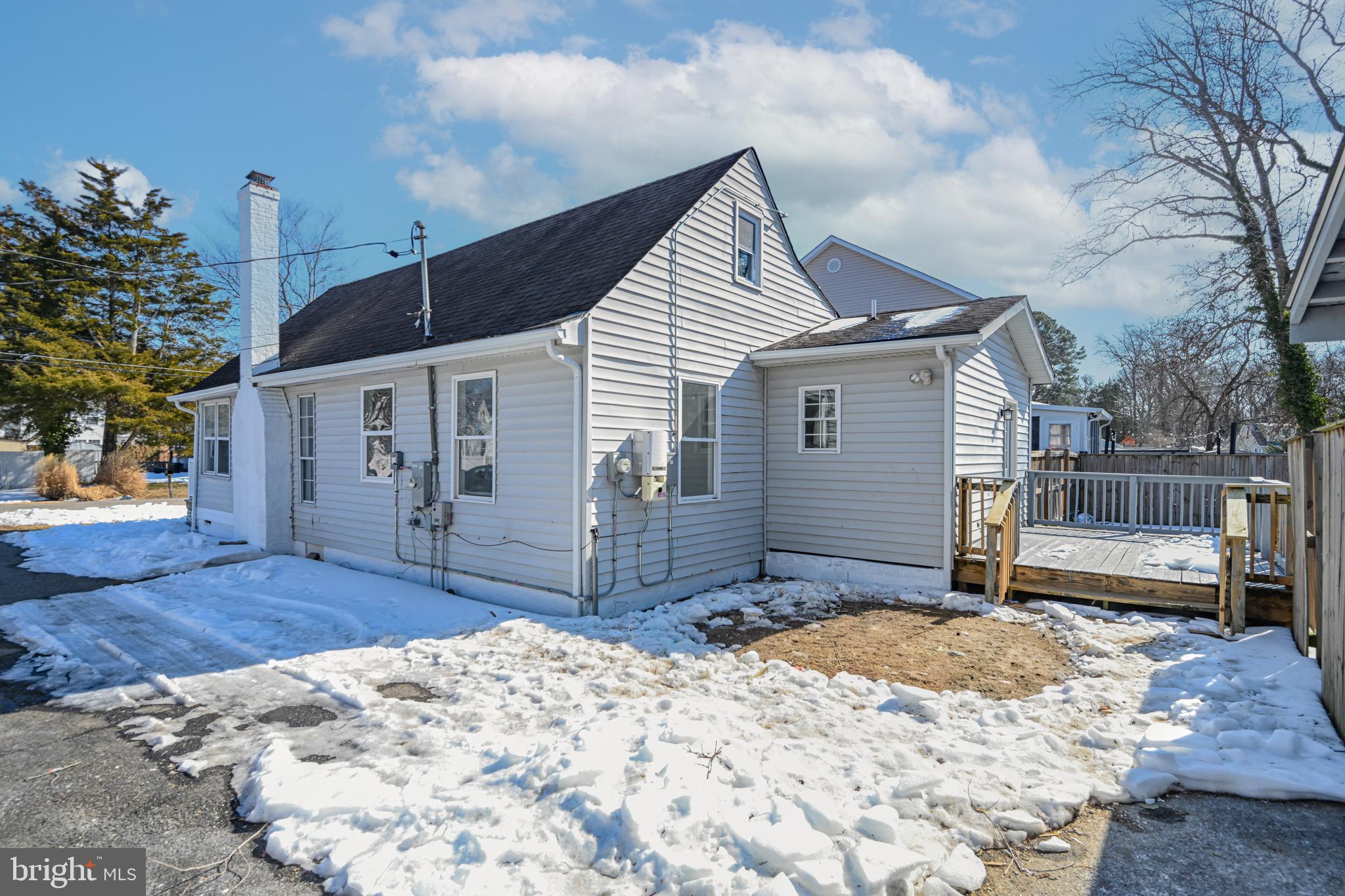 3718 4th Avenue Edgewater, MD 21037 - Photo 33 of 34 a front view of a house with a yard