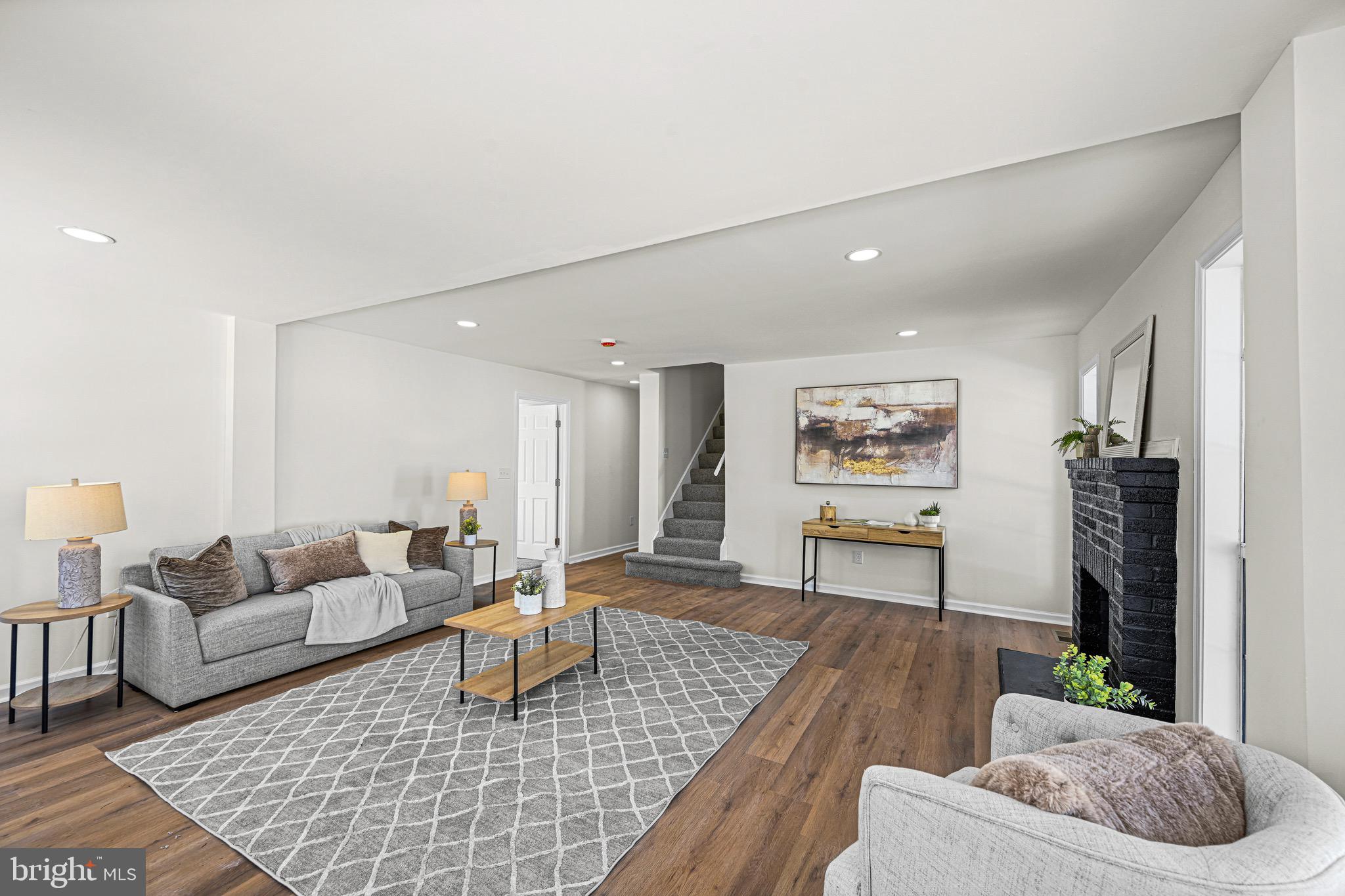 3718 4th Avenue Edgewater, MD 21037 - Photo 5 of 34 a living room with furniture and a couch