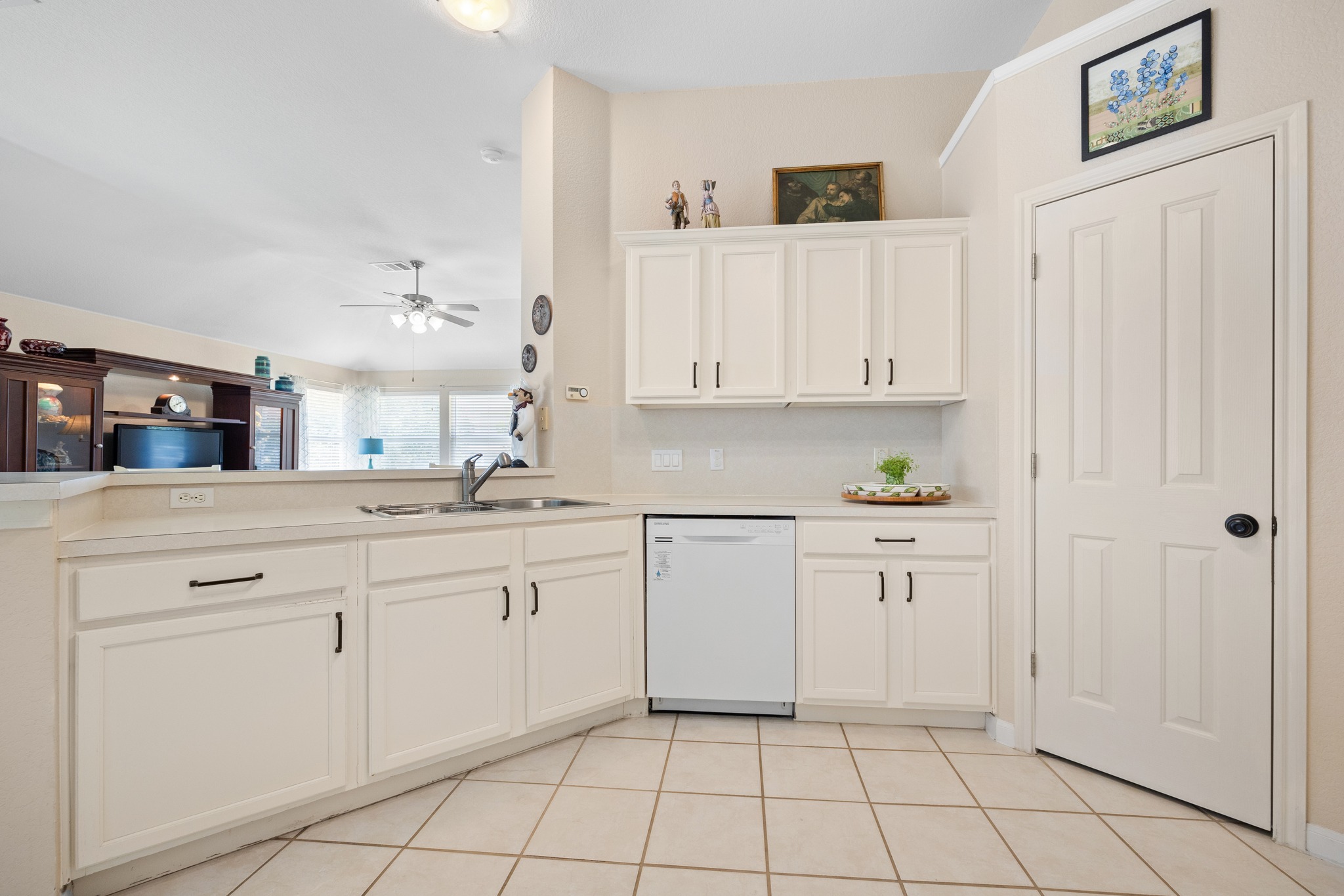 1108 Springbrook Road Pflugerville, TX 78660 - Photo 16 of 37 A well-appointed kitchen featuring a functional layout and ample counter space.
