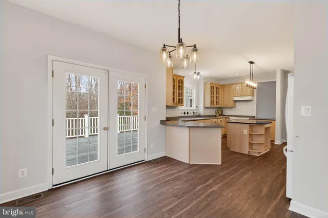 a utility room with two sink and a washer dryer