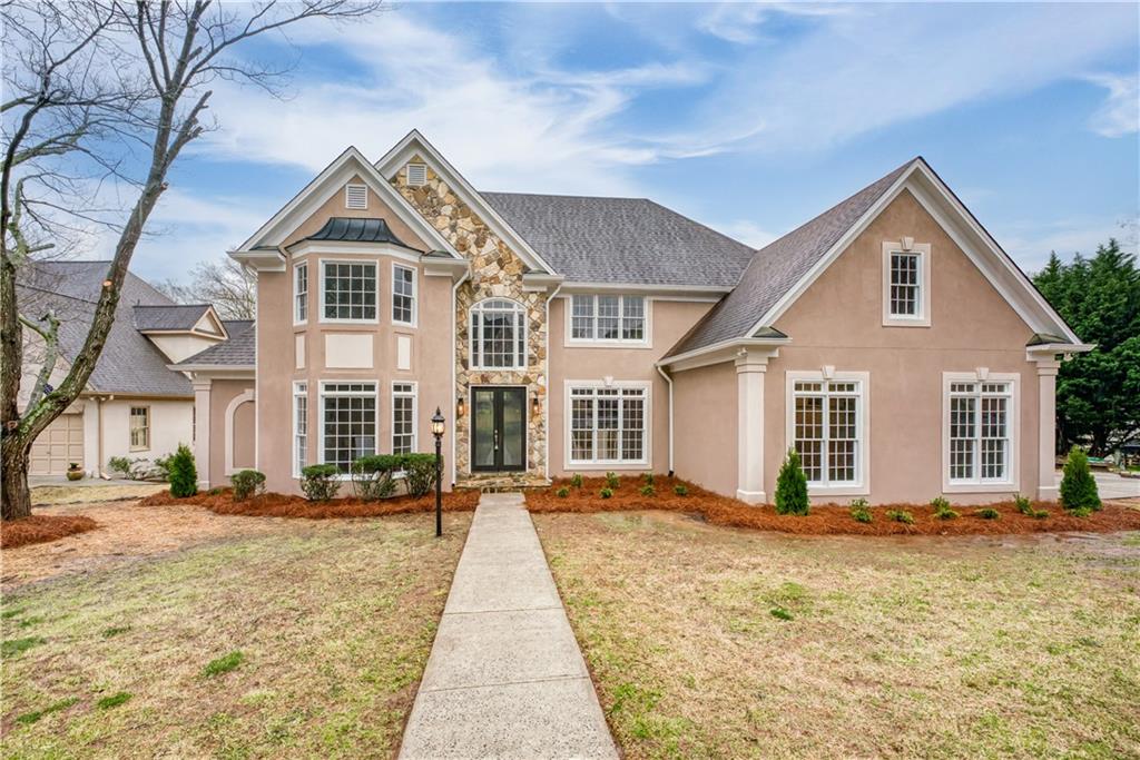 3550 Greystone Circle Atlanta, GA 30341 - Photo 1 of 1 a front view of a house with a yard
