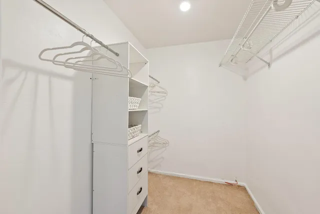 a bathroom with a sink and shower