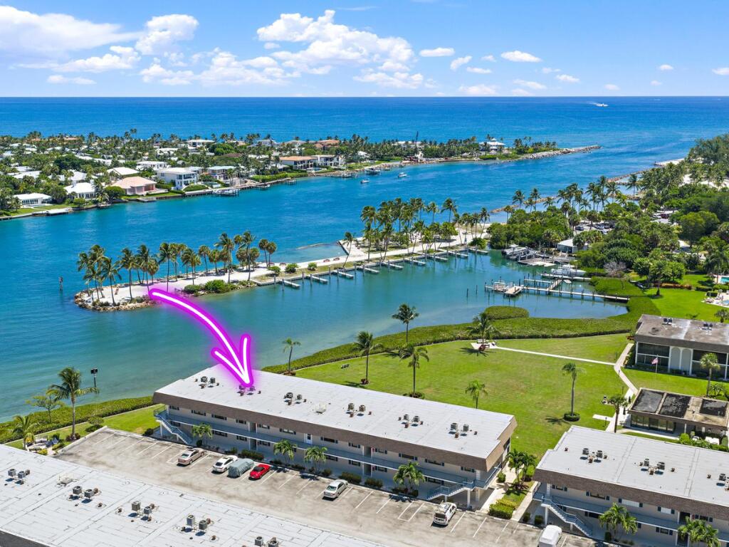 755 Saturn Street, Unit D205 Jupiter, FL 33477 - Photo 2 of 22 a view of a city