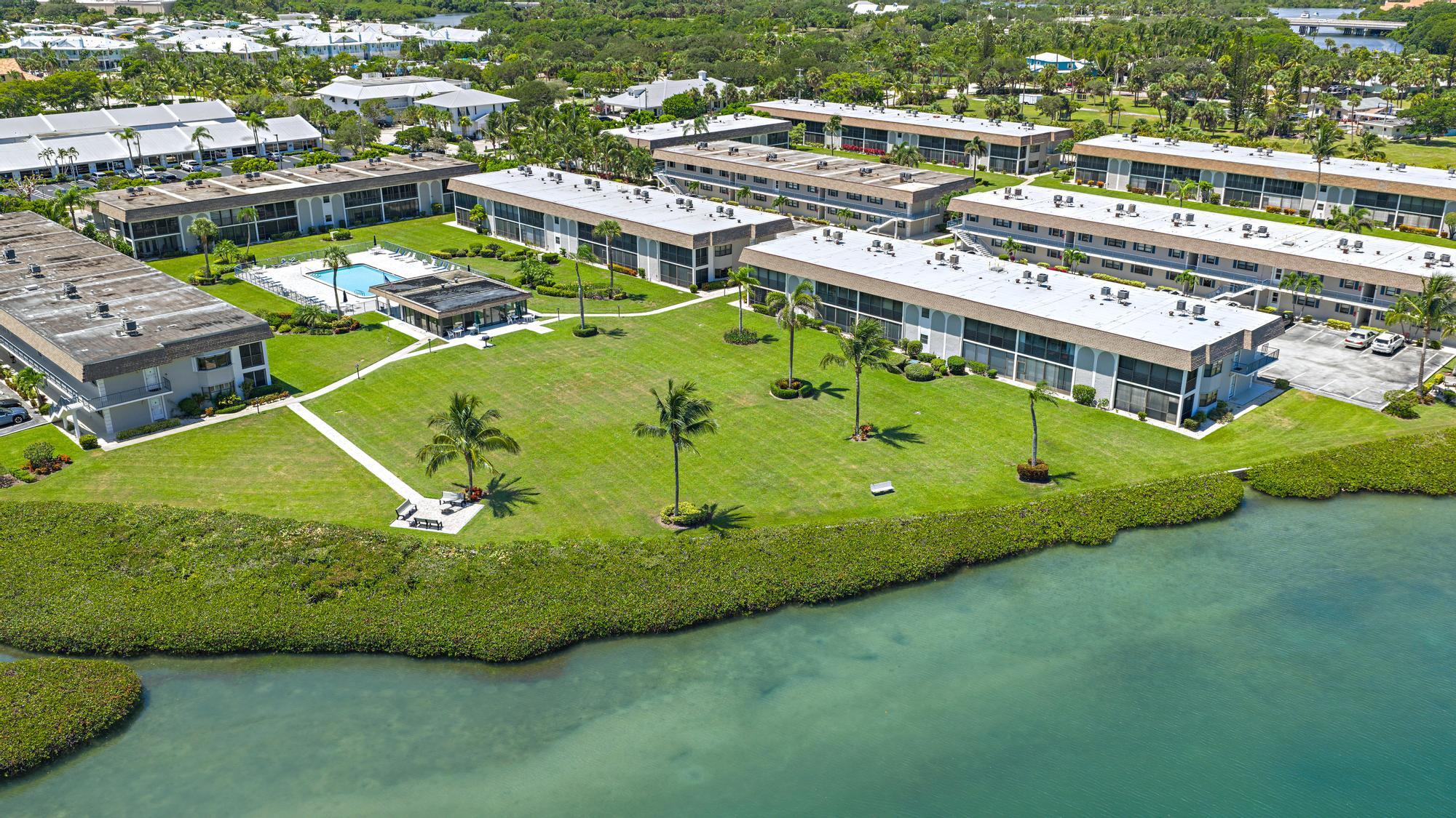755 Saturn Street, Unit D205 Jupiter, FL 33477 - Photo 22 of 22 an aerial view of a house with a yard
