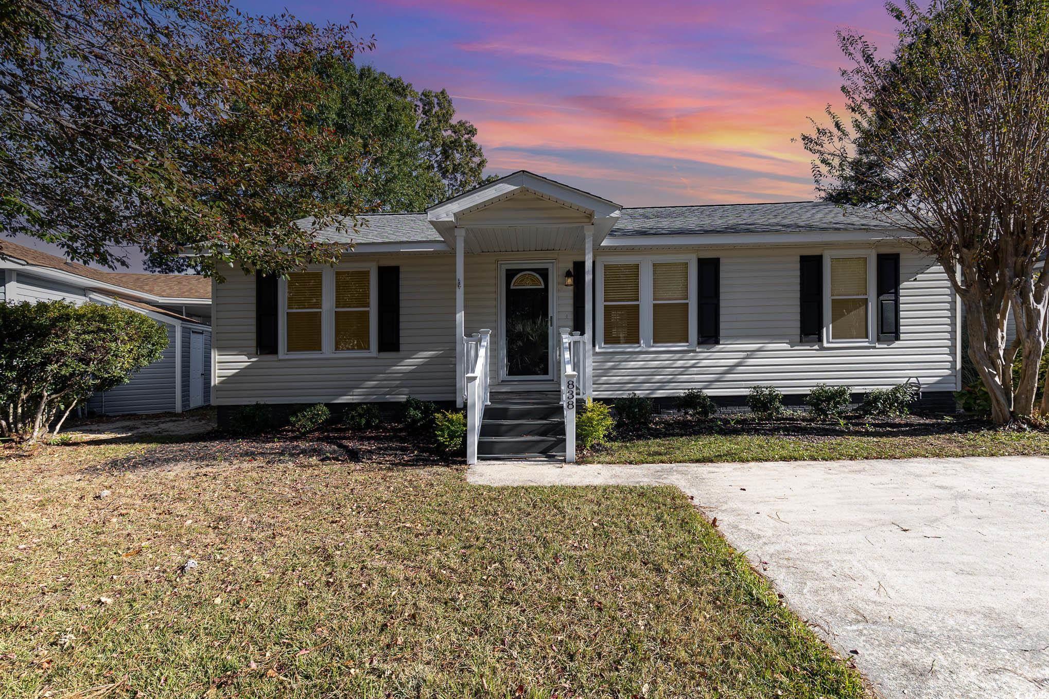 838 Marlin Court Murrells Inlet, SC 29576 - Photo 1 of 32 View of front of house with a lawn