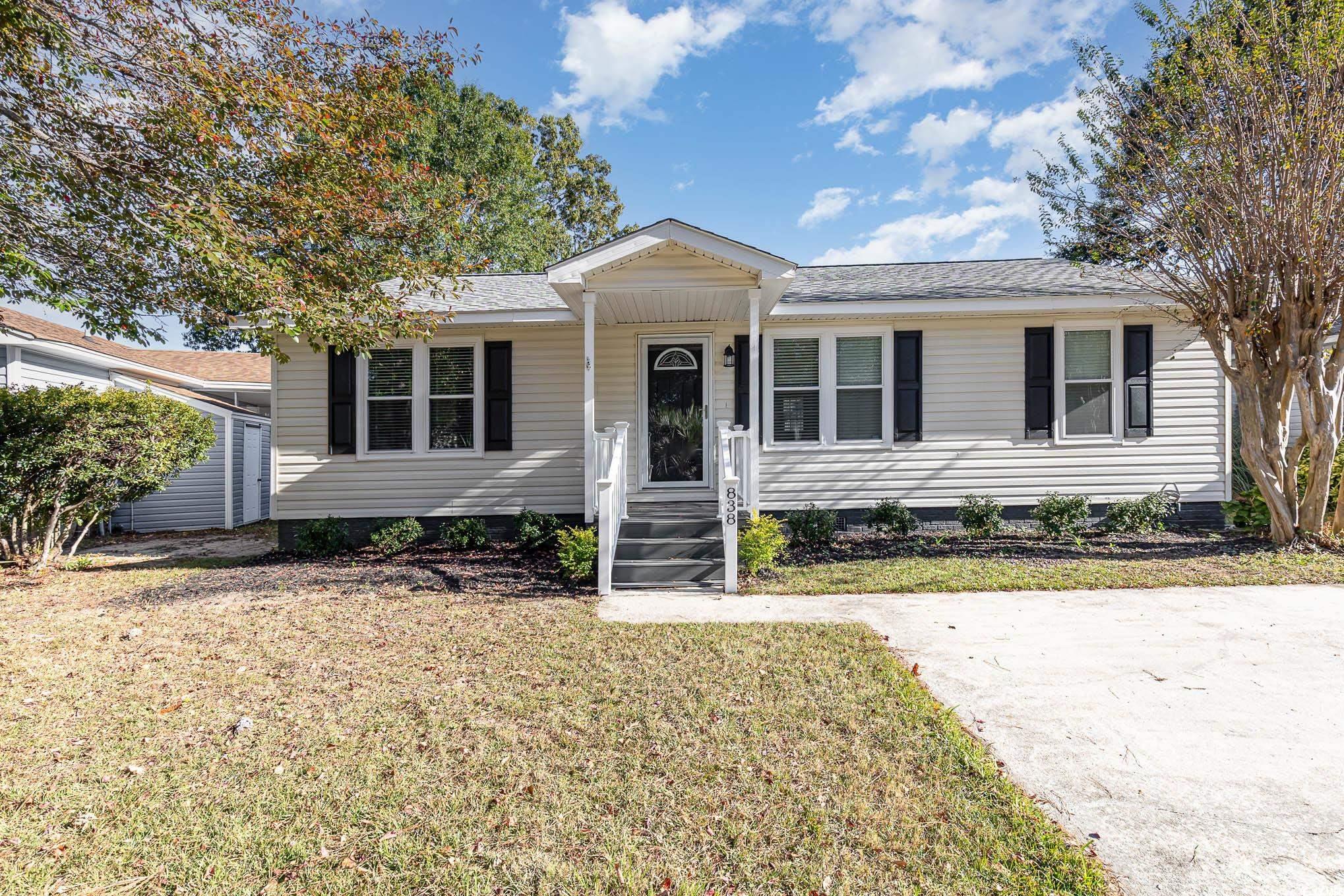 838 Marlin Court Murrells Inlet, SC 29576 - Photo 2 of 32 View of front of home featuring a front lawn