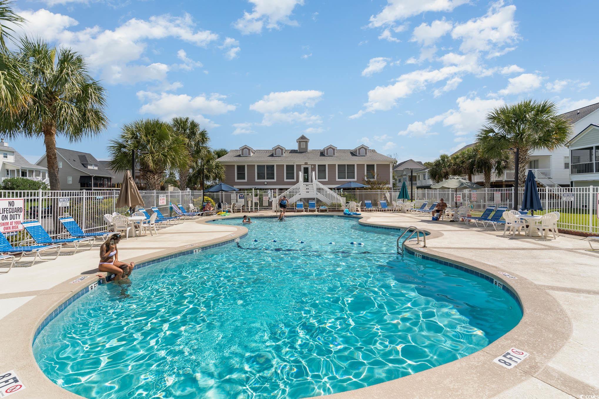 838 Marlin Court Murrells Inlet, SC 29576 - Photo 22 of 32 View of swimming pool featuring a patio area